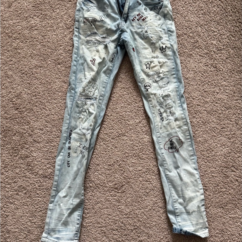 Men's Light Blue Skinny Jeans with Graphic Details